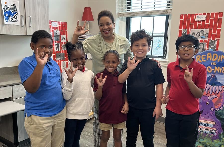  Staci Brown Brooks, Vice President of Charitable Giving for Alabama Power with ASD Students.